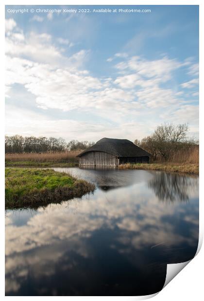 Hickling Broad boat house Print by Christopher Keeley