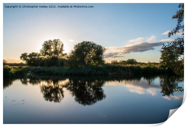 Dusk reflections on Norfolk Broads Print by Christopher Keeley