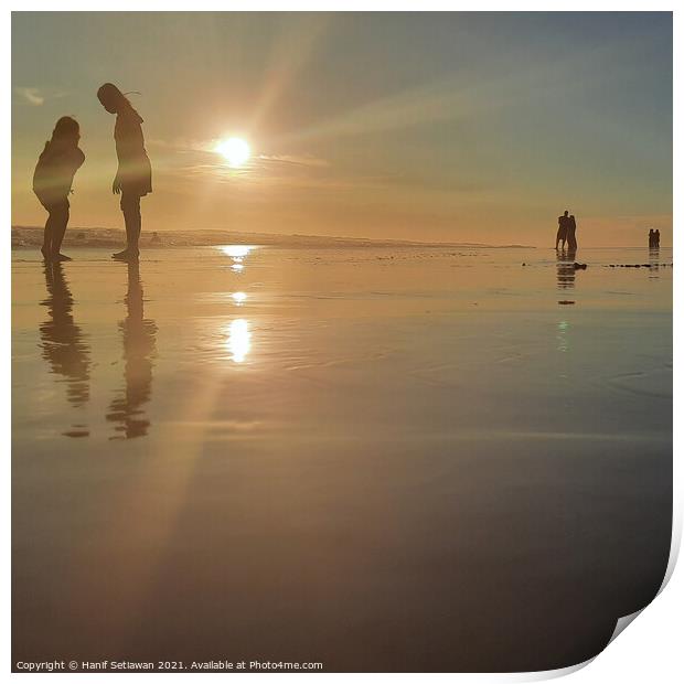 Silhouetted people in a row on sand beach Squared Print by Hanif Setiawan