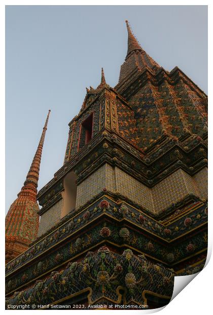 Unique view of a Buddha pagoda against clear sky. Print by Hanif Setiawan