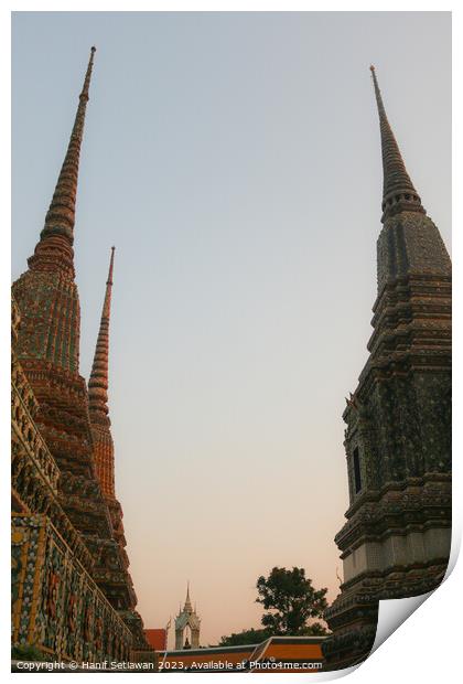Second view of two stupa against sky at Wat Pho Print by Hanif Setiawan
