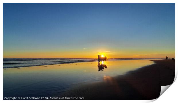 Silhouetted horse-drawn carriage beach sunset 3 Print by Hanif Setiawan