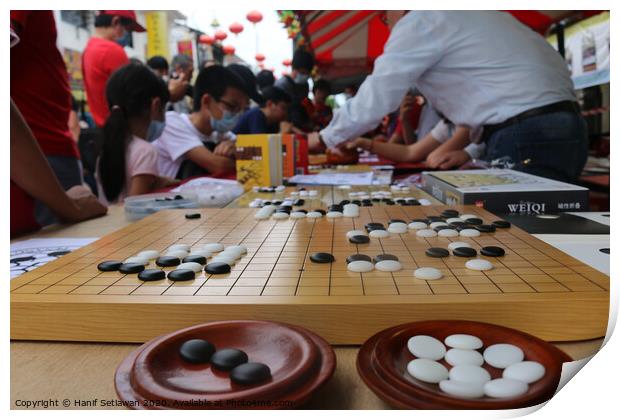 Chinese playing Go Game, Weiqi in a street. Print by Hanif Setiawan