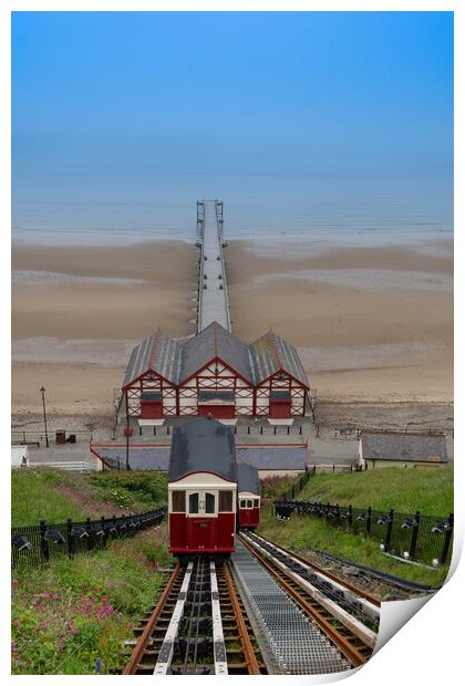 Saltburn cliff lift and pier on a summers day Print by Kevin Winter