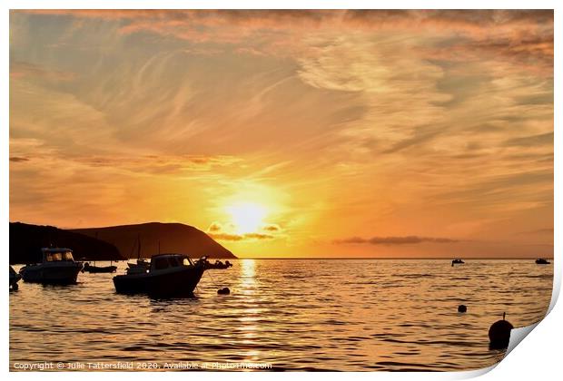 A sunset behind a boat on the sea Pembrokeshire Print by Julie Tattersfield