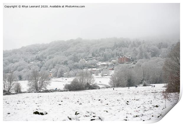 People enjoying snow on peachfield common, Malvern Print by Rhys Leonard