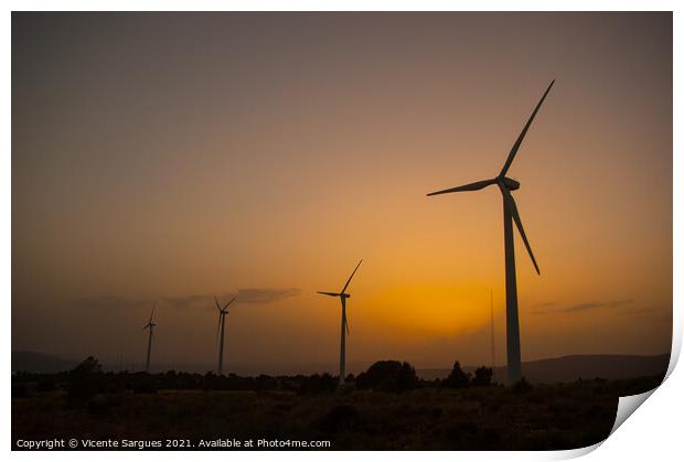 Windmills in a row at golden sunset light Print by Vicente Sargues