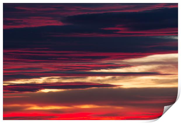 Red clouds in a sunset light Print by Arpad Radoczy