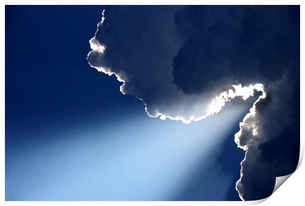 Sunrays on blue skythrough white clouds Print by Alessandro Della Torre