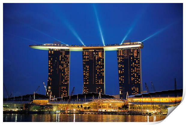 A lit up city at night with Marina Bay Sands Singapore in the background Print by Alessandro Della Torre