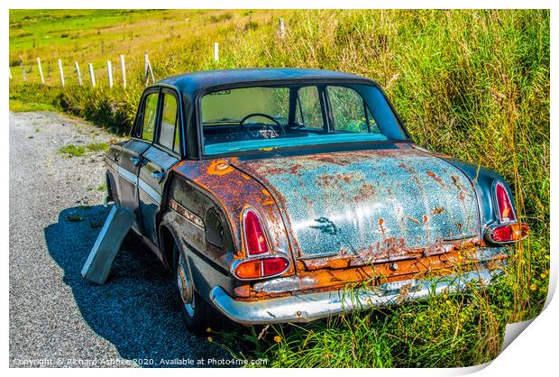 An old vintage car rusting in a Shetland farm Print by Richard Ashbee