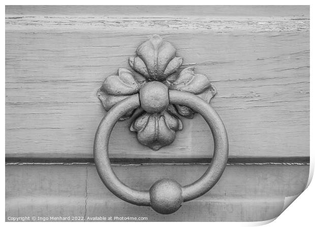A closeup shot of an old metal doorknob on a wooden door Print by Ingo Menhard