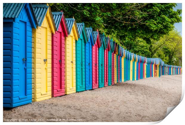 Brightly coloured beach huts at Llanbedrog, Wales. Print by Alan Taylor