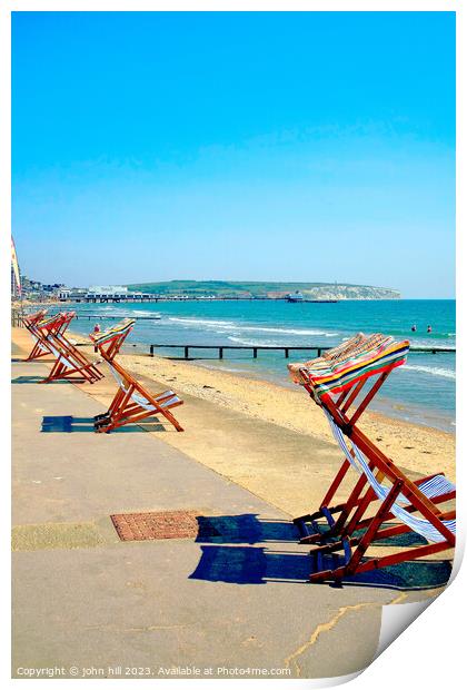 Early morning deckchairs at Sandown bay, Isle of Wight. Print by john hill