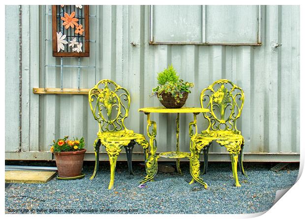 'Rest a while'. Ornamental table and chairs outside an artists studio at the marina at Old Leigh Essex, UK. Print by Peter Bolton