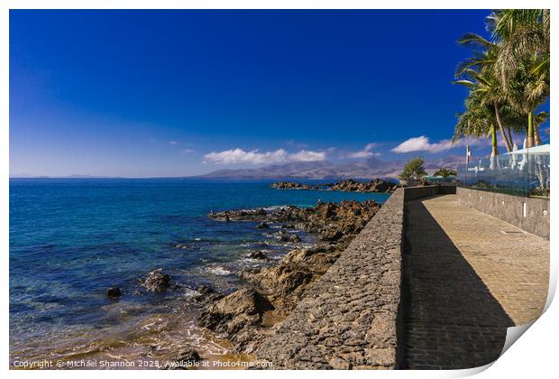 Sea view southwards from the promenade in Puerto d Print by Michael Shannon