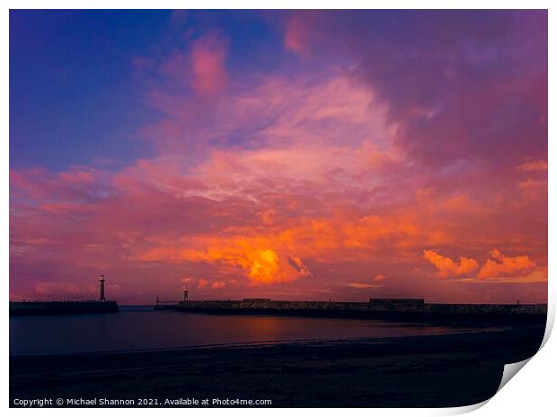 Colourful sky over the piers at Whitby in North Yo Print by Michael Shannon