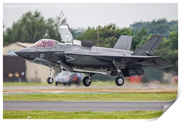 RAF F-35B lands vertically at the Royal International Air Tattoo  Print by MARTIN WOOD