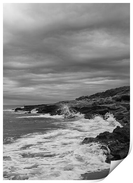 Waves crashing against rocks on a cloudy day Print by Vicen Photo