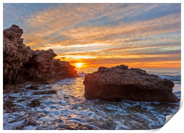 Photography with a sunrise between the rocks in a seascape Print by Vicen Photo
