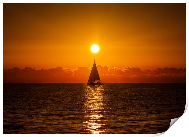 A lone sailboat sailing in the dawn sun Print by Vicen Photo