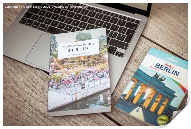 Planning a trip to Berlin with laptop on wooden table and travel guides Print by Kristof Bellens
