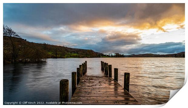 Coniston jetty at sunset Print by Cliff Kinch