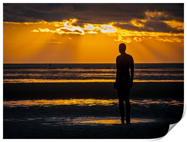 Anthony Gormley Statue standing on a beach in fron Print by Vicky Outen