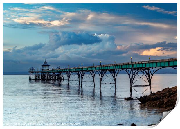 Clevedon Pier with stormy clouds Print by Rory Hailes