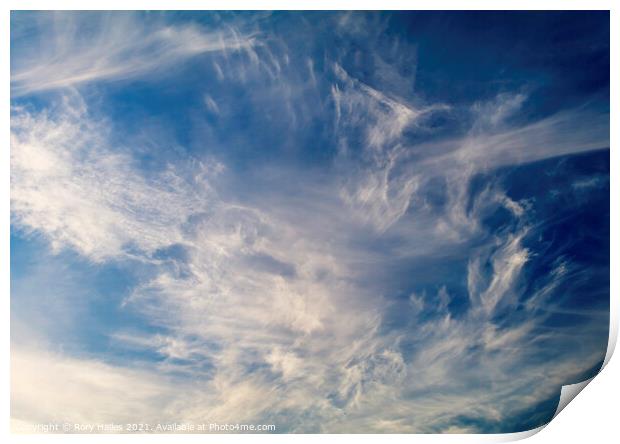 Cloud against a blue sky Print by Rory Hailes