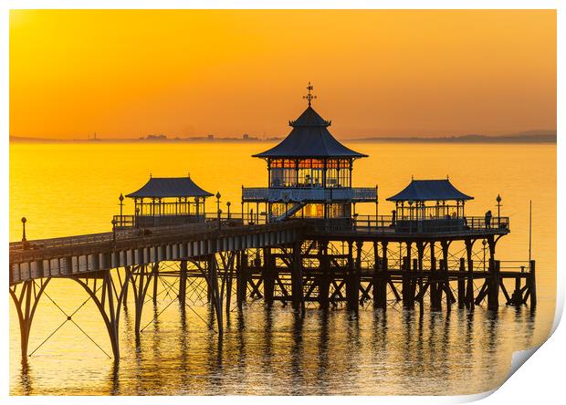 Clevedon Pier with a golden sunset Print by Rory Hailes