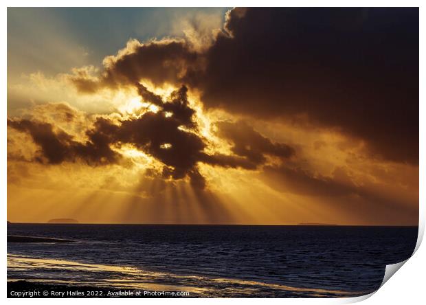Crepuscular rays breaking through the cloud cover Print by Rory Hailes