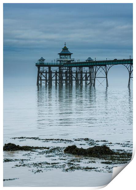 Clevedon Pier on a calm morning with reflection Print by Rory Hailes