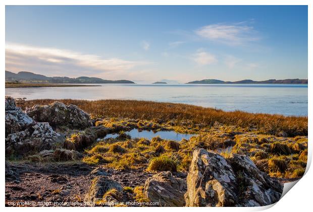 Rocky beach at Kirkcudbright bay at low tide on a sunny winters morning Print by SnapT Photography