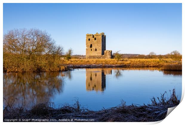 Threave Castle reflecting on the River Dee in the winter sun and Print by SnapT Photography