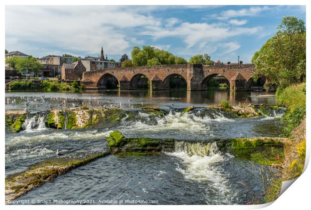 The River Nith flowing over the Caul weir in Dumfries, during summer in Scotland Print by SnapT Photography