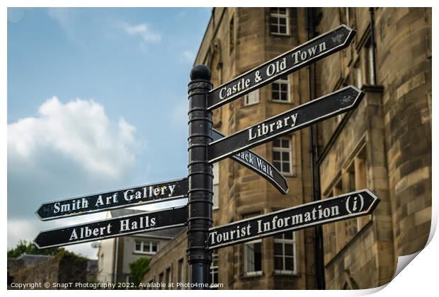 Sign post highlighting the directions to attractions in stirling town centre Print by SnapT Photography