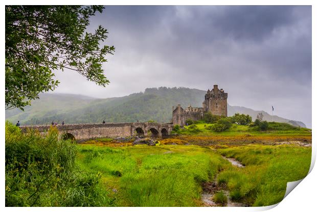 Looking out to Eilean Donan Castle, where three sea lochs meet, Loch Duich, Loch Long and Loch Alsh, on an overcast day in the Sco Print by SnapT Photography