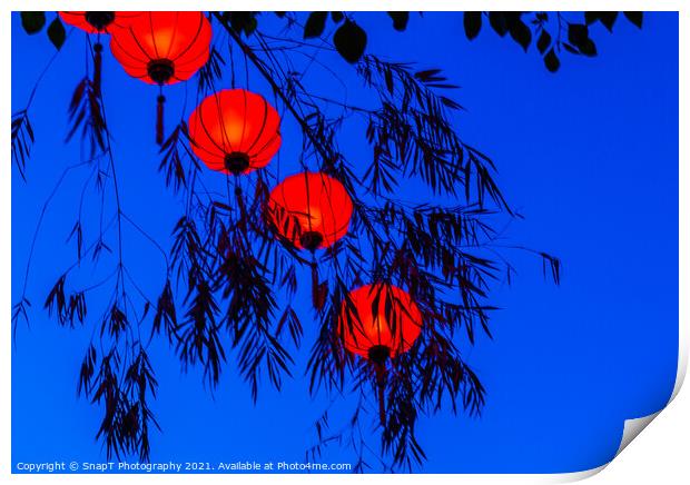 Red vietnamese or chinese lanterns contrasting with a blue sky Print by SnapT Photography