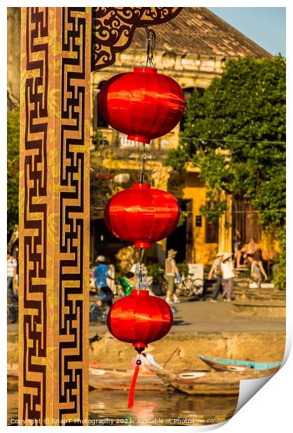 Three red vietnamese or chinese lanterns hanging in Hoi An, Vietnam Print by SnapT Photography
