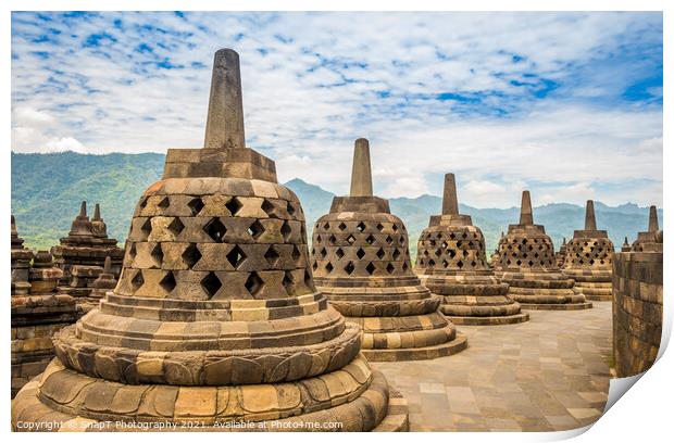 Stupas that look like bells on top of the Borobudur Buddhist temple, Indonesia Print by SnapT Photography