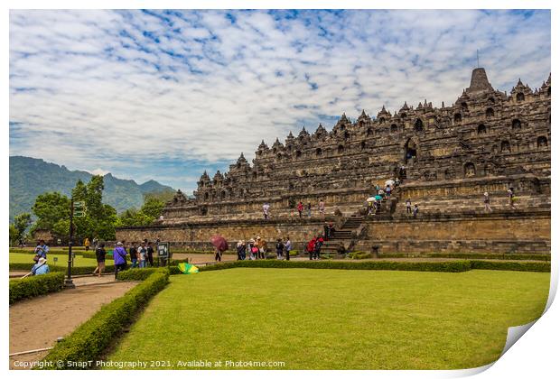 A line of tourists ascending the stairs on the Borobudur Buddhist temple, Indonesia Print by SnapT Photography