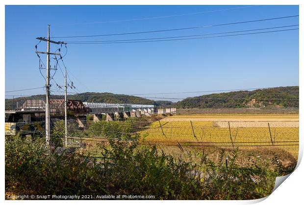 The 'Bridge of no Return' at the Korean DMZ from the South Korean side Print by SnapT Photography