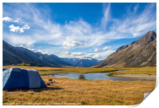 A tent pitched beside a river, surrounded by mountains, in New Zealand Print by SnapT Photography