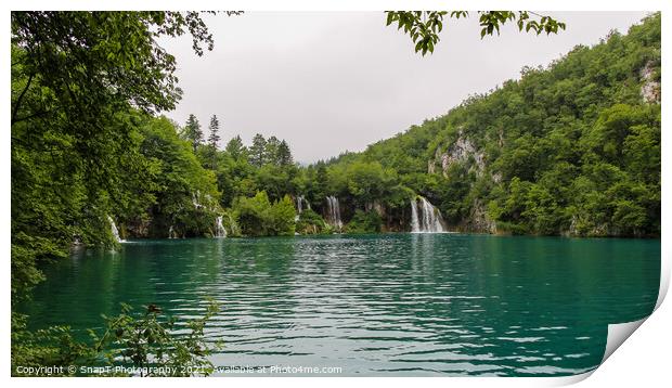 Water flowing over a series of waterfalls into a lake at Plitvice Lakes, Croatia Print by SnapT Photography