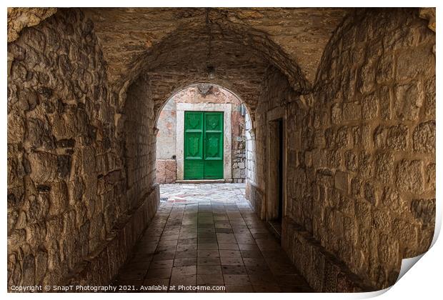 An alleyway in the old town of Kotor, Montenegro, with a green door at the end Print by SnapT Photography