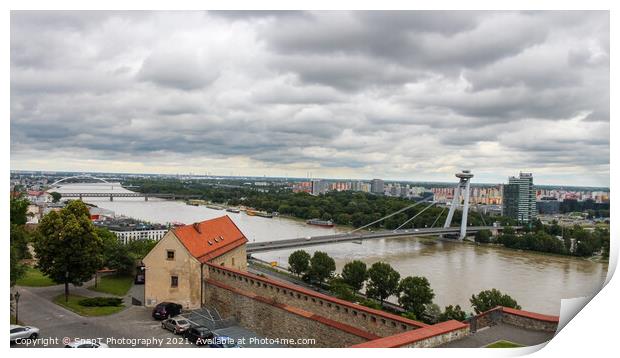 A view across the River Danube, Most SNP Bridge, and Ovsiste, Bratislava Print by SnapT Photography