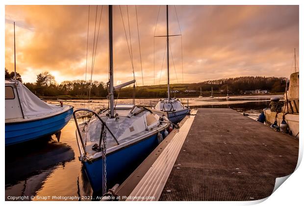 Yachts moored at Kirkcudbright marina at sunset in winter on the Dee estuary Print by SnapT Photography