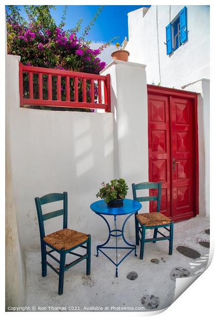 A Table and Two Chairs, Mykonos Town. Print by Ron Thomas
