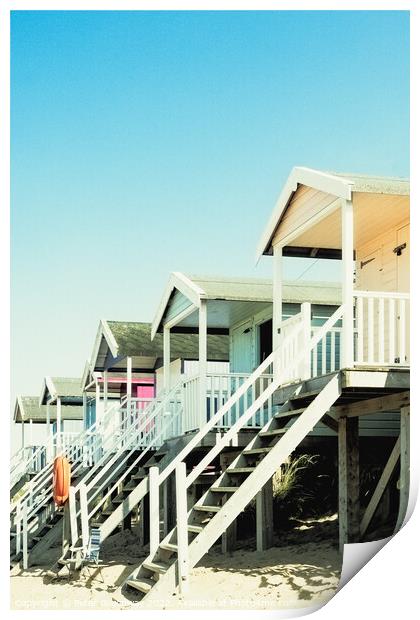 Stilted Beach Huts On The Beach At Wells-next-the-Sea Print by Peter Greenway